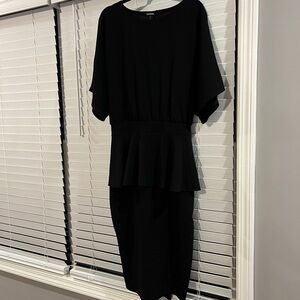 Boat neck peplum dress